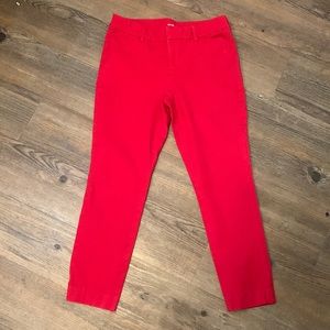 Old Navy Pixie Pants Size 10 Red-slight fading around seams.